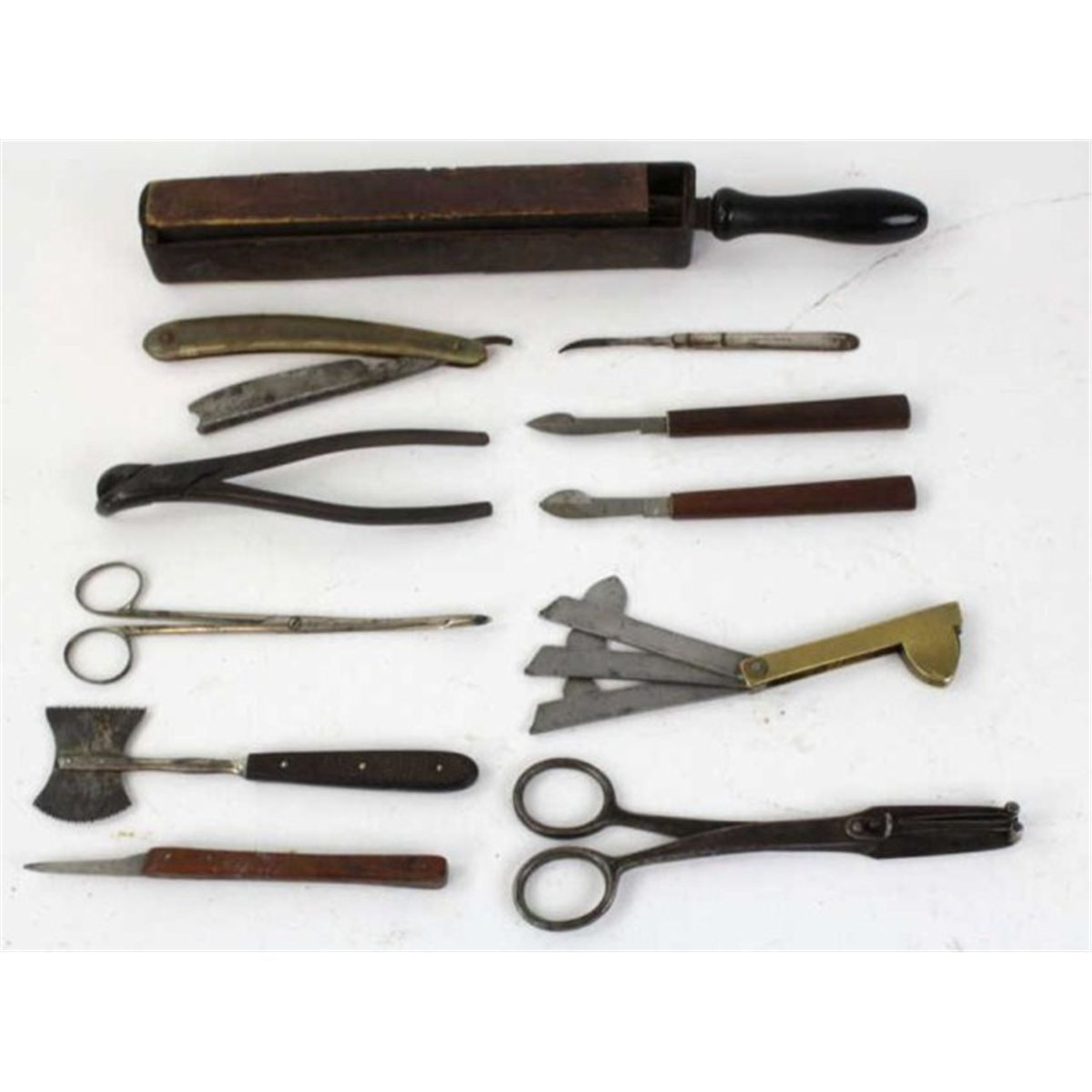 Collection of various items includes doctors instruments and straight ...