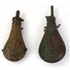Image 1 : Collection of 2 powder flasks includes original US peace flask 10" long, with heavy patina and overa