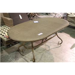 CAST METAL AND BROWN RATTAN PATIO TABLE