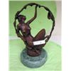 Image 1 : Bronze statue on marble stone