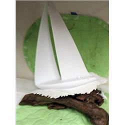 Sail boat on driftwood base