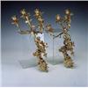 Image 1 : Pareja de apliques de 4 luces en forma de amorcillos sosteniendo ramas, en bronce dorado.