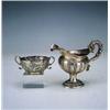 Image 1 : Catavinos en plata decorado con veneras y dos asas en forma de cabeza de pájaro.