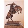 Image 1 : Wooly Chaps Bronze Sculpture by Frederic Remington. 8.5"H x 7"L x 4"W