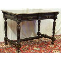 Late C19th Continental walnut writing table with gadrooned top above 2 frieze