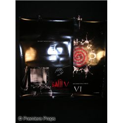 Saw IV and Signed Saw V Movie Posters