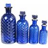 Image 1 : Four Cobalt Blue Embossed Poison Bottles