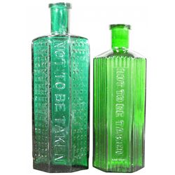 Two Emerald Embossed Glass Poison Bottles