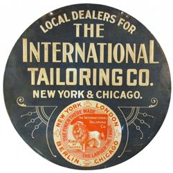 The International Tailoring Co. Embossed Tin Sign
