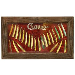 Clauss razor display case displaying 24  razors.