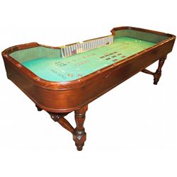 Early craps table with beautiful turned legs
