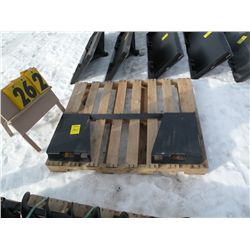 Skid loader universal tool plate