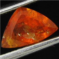 0.75ct Mandarin Fire Orange Clinohumite Trillion (GEM-44036)