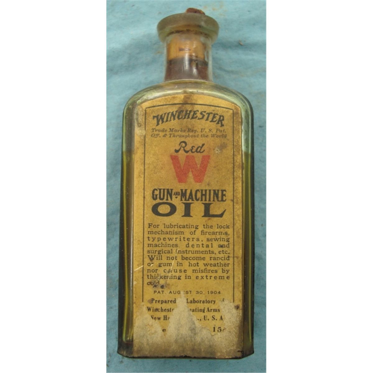 Early Embossed Winchester Gun Oil Bottle