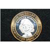 Image 1 : MGM Grand, Limited Edition Two-Tone $10 Gaming Token, "Marilyn Monroe" .999 Fine