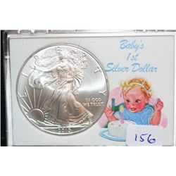 2010 Silver Eagle $1, "Baby's 1st Silver Dollar"