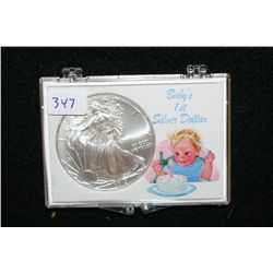 2010 Silver Eagle $1, "Baby's 1st Silver Dollar"
