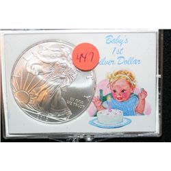 2010 Silver Eagle $1, "Baby's 1st Silver Dollar"