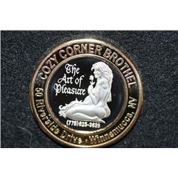 Cozy Corner Brothel, Limited Edition Two-Tone $10 Silver State Brothel Token, "The Art of Pleasure",