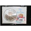 Image 1 : 2010 Silver Eagle Dollar with Baby's First Silver Dollar Holder