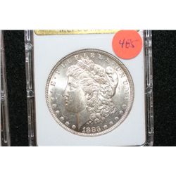 1883-O Silver Morgan $1, MCPCG Graded MS62