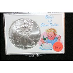 2010 Silver Eagle $1, "Baby's 1st Silver Dollar"