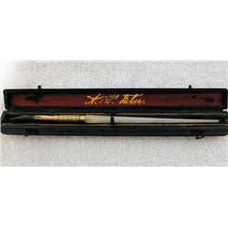 Antique quill pen in velvet lined box