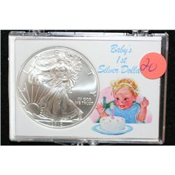 2010 Silver Eagle $1, "Baby's 1st Silver Dollar"