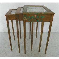 Paint decorated glass top nest of 3 tables