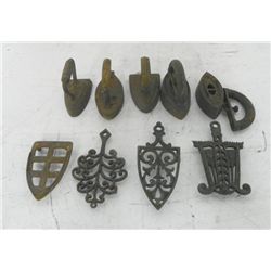 4 iron trivets & 4 irons