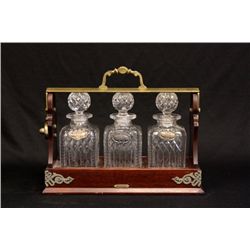 Tiffany liquor caddy with 3 crystal decanters