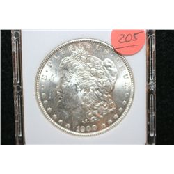 1900 Silver Morgan $1, MCPCG Graded MS62