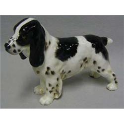 A black and white Cocker Spaniel, HN 1109, h