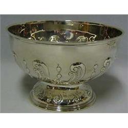 A circular silver pedestal bowl, gadroon emb