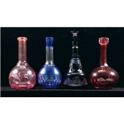 Four Attractive Barber's Bottles