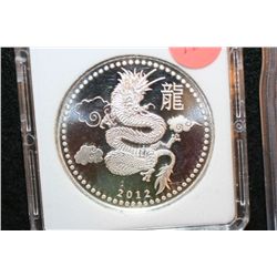 2012 Year of the Dragon Foreign Coin, .999 Fine 1 Oz., MCPCG Graded PF69