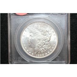 1899 Silver Morgan $1, SEGS Graded MS63