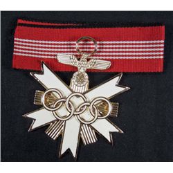 GERMAN NAZI BERLIN OLYMPICS ENAMELED MERIT CROSS W/ RIBBON IN GOLD