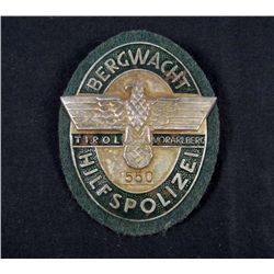 GERMAN NAZI TIROL MOUNTAIN POLICE BADGE W/ GREEN WOOL BACKING