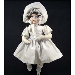 BISQUE MUSICAL DOLL - PLAYS  BRAHMS'S LULLABY