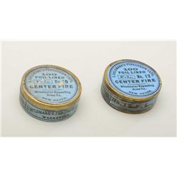 A lot consisting of 2 gold marked percussion  caps, #10 and #12 size, blue labels, by  Winchester Re