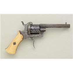 European double action pinfire revolver,  engraved blue finish, ivory grips, serial  #550 on right s