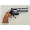 Image 2 : Colt Python .357 magnum cal., 4" barrel, blue  finish, checkered wood medallion grips,  serial #K522