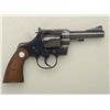 Image 2 : Colt Trooper Model DA revolver, .22LR cal.,  4” barrel, blue finish, checkered wood  medallion grips