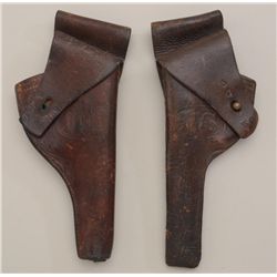 Lot of two U.S. military leather flap  holsters for DA revolvers, one in overall  fair to good condi