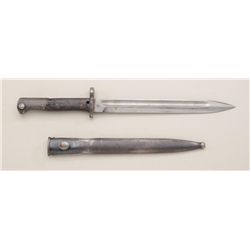 Argentine Mauser bayonet and scabbard in  overall fair to good condition; scabbard  shows old dents 