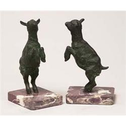pair of patinated bronze prancing lambs Mo...
