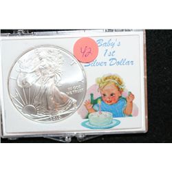 2010 Silver Eagle $1, "Baby's 1st Silver Dollar"