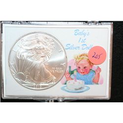 2010 Silver Eagle $1, "Baby's 1st Silver Dollar"