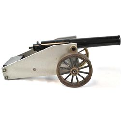 Unmarked 16 ga. blank firing signal cannon with brass wheels, steel barrel and carriage, 16  overall